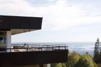 a building with a view of the ocean at Voksenasen Hotell; Best Western Signature Collection in Oslo