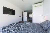 Postel nebo postele na pokoji v ubytování Villa Paradise