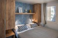 Posteľ alebo postele v izbe v ubytovaní Falkensteiner Premium Mobile Homes and Camping Zadar