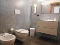 Kúpeľňa v ubytovaní Gabbiano Apartments
