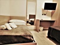 Posteľ alebo postele v izbe v ubytovaní Gabbiano Apartments