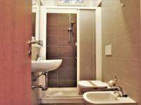 Kúpeľňa v ubytovaní Gabbiano Apartments