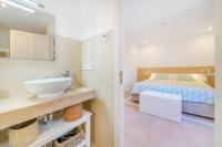 Łóżko lub łóżka w pokoju w obiekcie Petit Biniaraix - Ex Menditzu Rooms