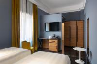 Posteľ alebo postele v izbe v ubytovaní Hotel Poerio 25 Boutique Stay