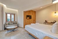Posteľ alebo postele v izbe v ubytovaní Harma Boutique Hotel
