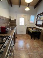 Kuchyň nebo kuchyňský kout v ubytování LOFT Del SOL, Centro del Pueblo con Aire Acondicionado