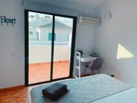 A bed or beds in a room at ZajaraHome