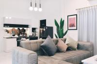 Posezení v ubytování Nadda Pool Villa Ranong