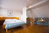 Ein Bett oder Betten in einem Zimmer der Unterkunft Hotel Kurpfalzstuben