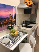Kuchyňa alebo kuchynka v ubytovaní Top home Arco di Parma ROMA centro