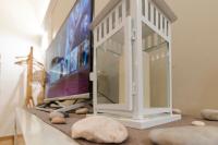 A television and/or entertainment centre at Don Fulippu Home to city center