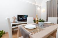 A television and/or entertainment centre at Don Fulippu Home to city center