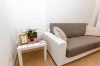 A seating area at Don Fulippu Home to city center