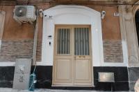 The facade or entrance of Don Fulippu Home to city center