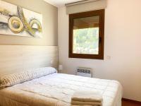 Cama o camas de una habitaci&oacute;n en Apartamento Font Blanca en Arinsal