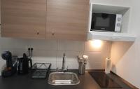 Kuchyňa alebo kuchynka v ubytovaní Apartmani Karlo