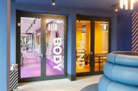 A seating area at CX Turin Vanchiglia