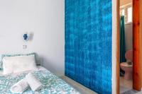 Postel nebo postele na pokoji v ubytování Antoniadi Rooms