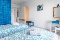 Postel nebo postele na pokoji v ubytování Antoniadi Rooms