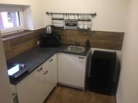 Kuchyň nebo kuchyňský kout v ubytování Apartmán Krkonoše