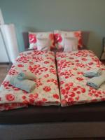 Postel nebo postele na pokoji v ubytování Apartmán Krkonoše