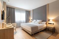 Postel nebo postele na pokoji v ubytování Aparthotel Attica21 As Galeras