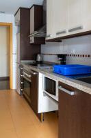 A kitchen or kitchenette at Apartamento Completo Torresol V