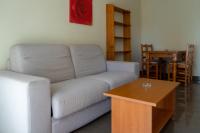A seating area at Apartamento Completo Torresol V