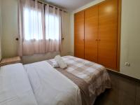 A bed or beds in a room at Apartamento Completo Torresol V