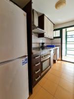 A kitchen or kitchenette at Apartamento Completo Torresol V