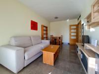 A seating area at Apartamento Completo Torresol V