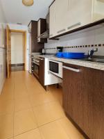 A kitchen or kitchenette at Apartamento Completo Torresol V