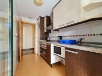 A kitchen or kitchenette at Apartamento Completo Torresol V