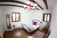 Postel nebo postele na pokoji v ubytování La Casa del Cura