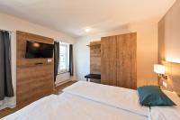 Postel nebo postele na pokoji v ubytování Hotel zum Hirschen