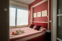 Łóżko lub łóżka w pokoju w obiekcie Beach House,Giardino,Piscina,Spiaggia, 6 posti