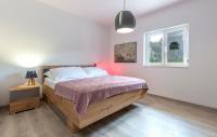 Posteľ alebo postele v izbe v ubytovaní Villa Ume - heated pool, sauna, volleyball court