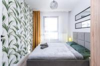 Posteľ alebo postele v izbe v ubytovaní Dąbska Street Krakow - Luxury Apartments