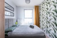 Posteľ alebo postele v izbe v ubytovaní Dąbska Street Krakow - Luxury Apartments