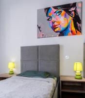 Posteľ alebo postele v izbe v ubytovaní Dąbska Street Krakow - Luxury Apartments