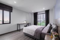 Postel nebo postele na pokoji v ubytování Aqua Residences อควา เรสซิเดนซ์ ห้องพักใหม่ให้เช่า ติดรถไฟฟ้าสถานีวุฒากาศ