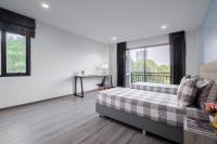 Postel nebo postele na pokoji v ubytování Aqua Residences อควา เรสซิเดนซ์ ห้องพักใหม่ให้เช่า ติดรถไฟฟ้าสถานีวุฒากาศ