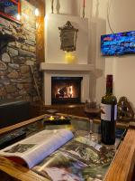 TV a/nebo společenská místnost v ubytování FoRest Loft