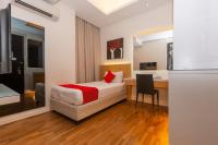 MIO BOUTIQUE Hotelにあるベッド