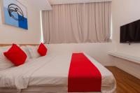 MIO BOUTIQUE Hotelにあるベッド
