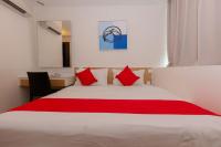 MIO BOUTIQUE Hotelにあるベッド