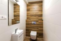 Kúpeľňa v ubytovaní VacationClub – Szklarska Park VacationHome 4