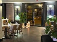 Reštaurácia alebo iné gastronomické zariadenie v ubytovaní Arena Hotel Spa & Wellness