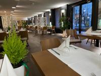 Reštaurácia alebo iné gastronomické zariadenie v ubytovaní Arena Hotel Spa & Wellness