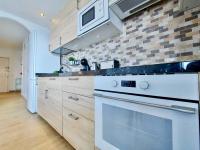 A kitchen or kitchenette at Coastview Terrace Studio by TOR